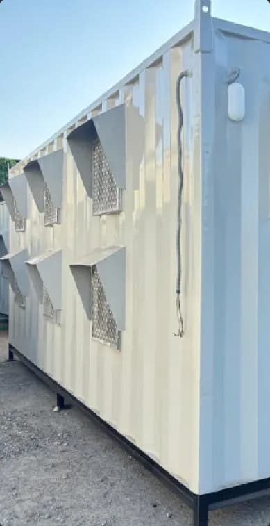 Row of Quad Cabins accommodation units with louvred vents
